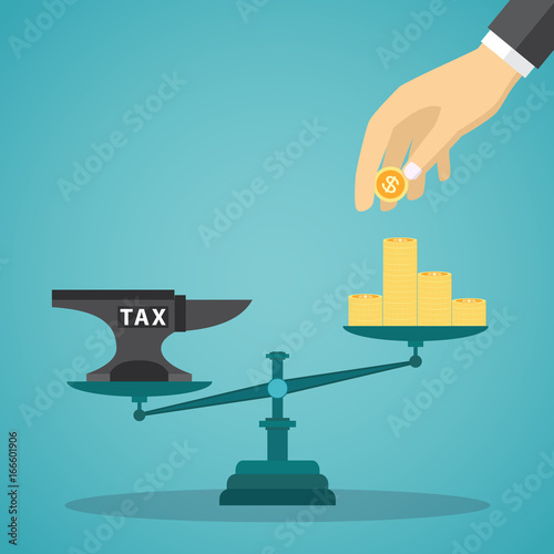 Businessman use coin balancing with TAX on scales.