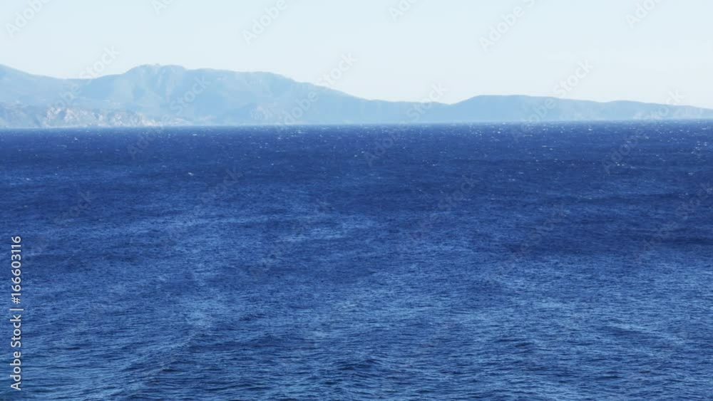 Wind blows across Mediterranean Sea open water, wide Wind blows across Mediterranean Sea open water, wide
