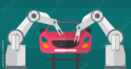 Robotic arm working on a conveyor for assembly of cars