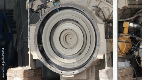 engine starting. Test start of a diesel engine. Trial run of a diesel engine. flywheel turns. flywheel begins turns