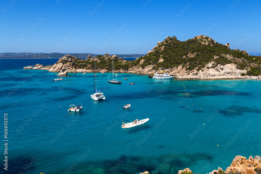 Archipelago of La Maddalena, Italy. Boats in a picturesque bay with clear water