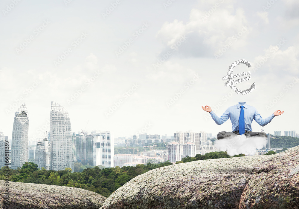 Obraz premium Headless meditating businessman