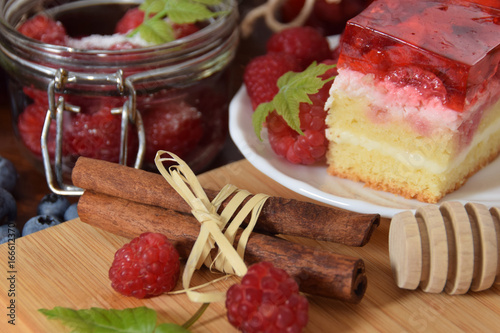 Tasty sweet cake with raspberries and jelly
