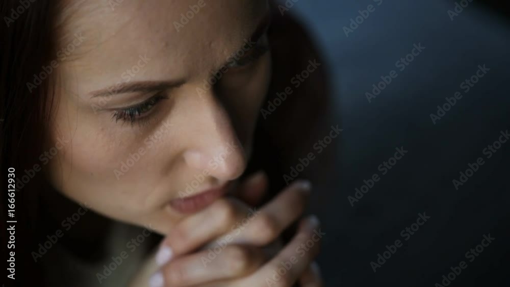 Hopeless adult woman thinking about her problems Hopeless adult woman thinking about her problems