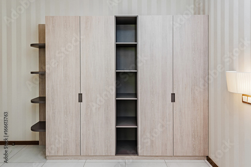 Konstfotografi Modern wooden wardrobe in the room