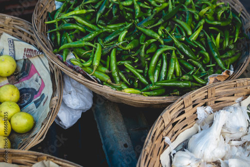 Baskets full of peppers  garlic  and lemons