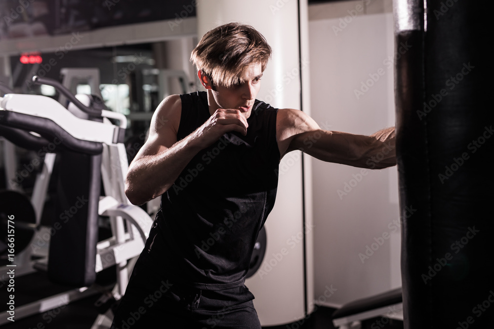 Boxer With Punch Bag In Action - A Man With A Tattoo In Red Boxing Gloves - Boxing Boxer With Punch Bag In Action - A Man With A Tattoo In Red Boxing Gloves - Boxing
