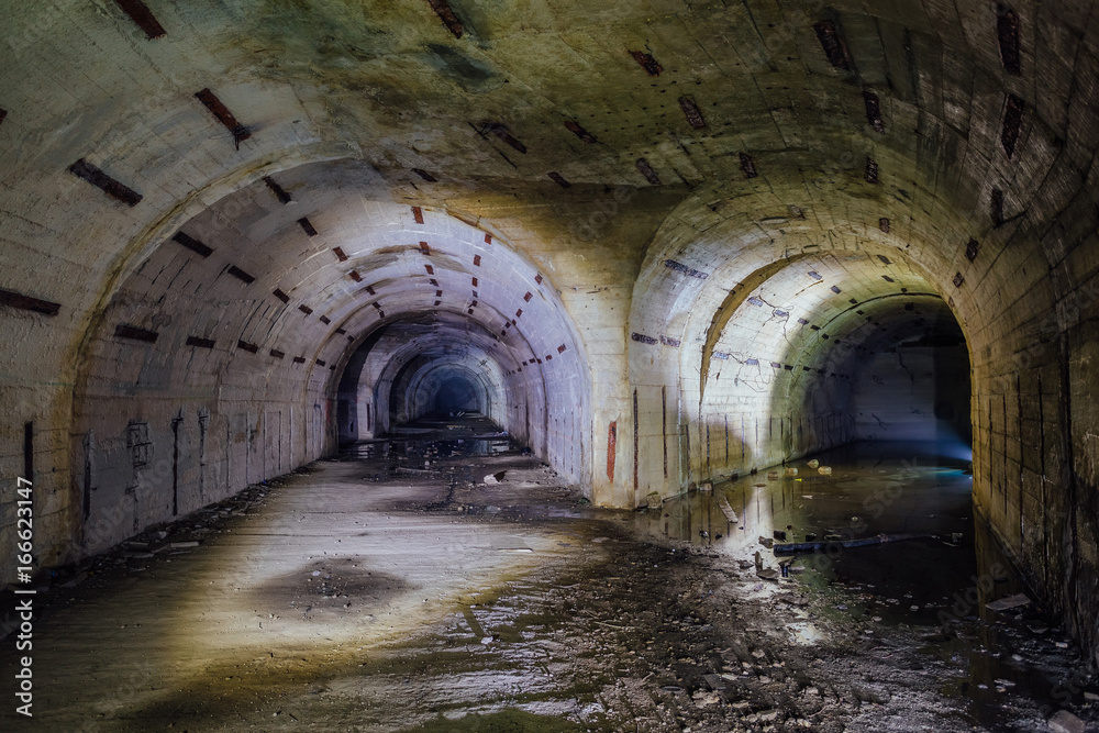 Fototapeta premium Tunnel fork at the Object 221, abandoned soviet bunker, reserve command post of Black Sea Fleet