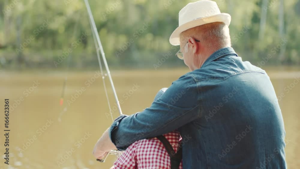 Family hobby is fishing at the lake Family hobby is fishing at the lake