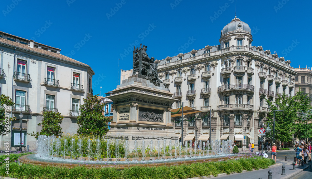 Granada, Spain, juli 1, 2017: Statue and Fountain on Plaza de Carmen