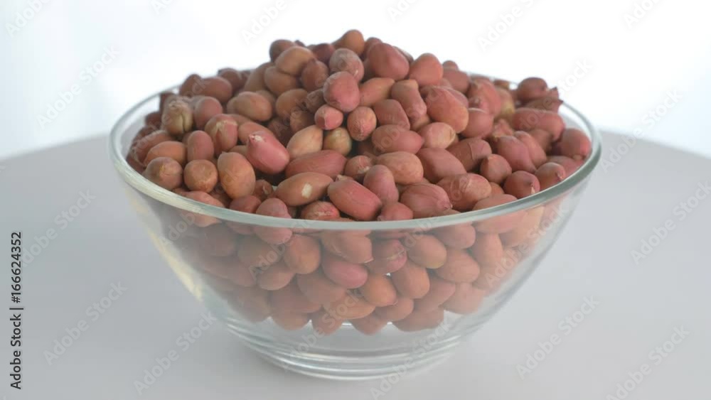 The nut peanut rotates on the turntable. The nut peanut rotates on the turntable.