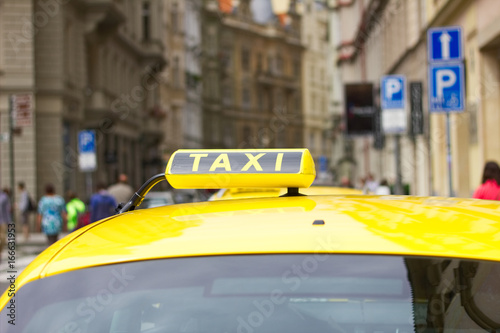 Taxi car in the city street of Prague, Czech Republic