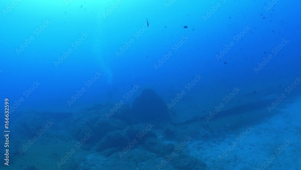 Scuba divers swim over plane crash, Mediterranean Sea Scuba divers swim over plane crash, Mediterranean Sea