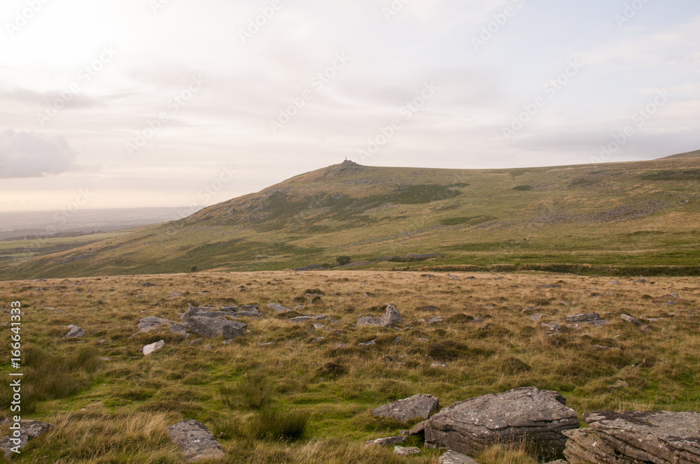 Rocks on Dartmoor with Widgery Cross in the distance