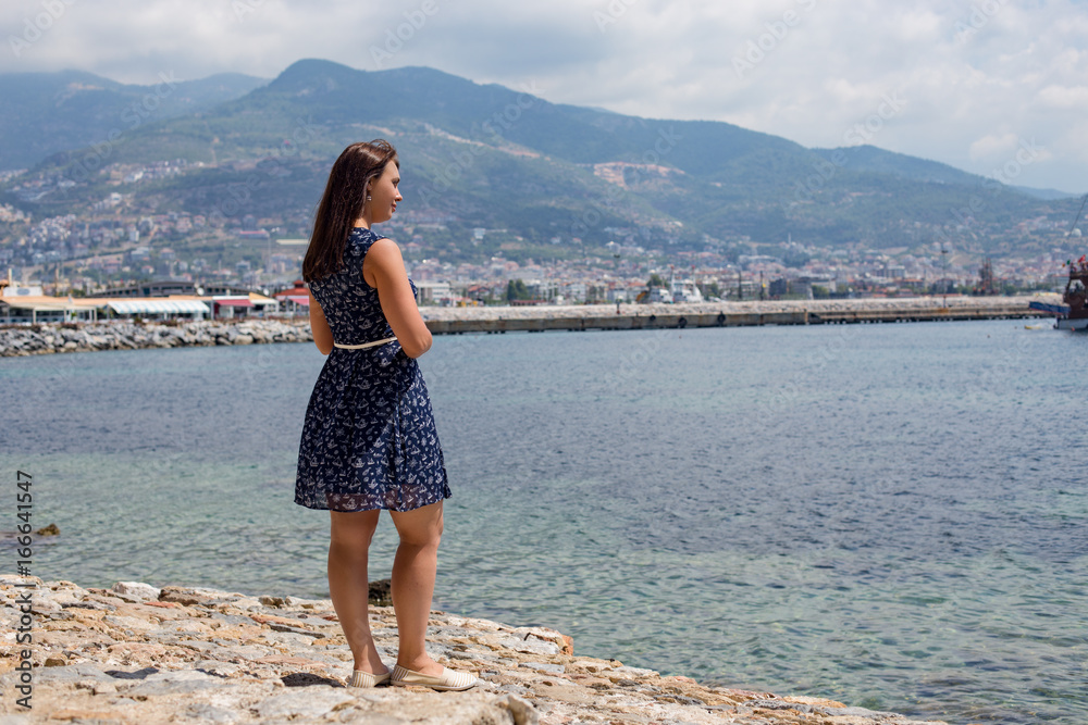 Woman enjoying view of Mediterranean town