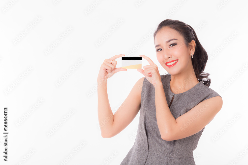 Beautiful Asian Woman showing credit card Isolated on white background Beautiful Asian Woman showing credit card Isolated on white background