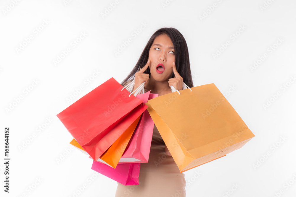 Women shocked when she saw shopping bag in her hands Women shocked when she saw shopping bag in her hands