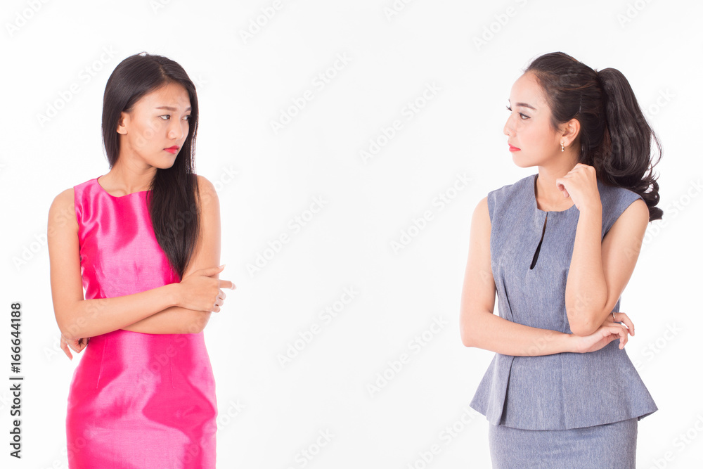 Two jealous business woman isolated on white background Two jealous business woman isolated on white background