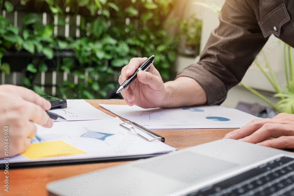 Business meeting in outdoor. documents account managers crew working with new startup project Idea presentation, analyse marketing plans Business meeting in outdoor. documents account managers crew working with new startup project Idea presentation, analyse marketing plans