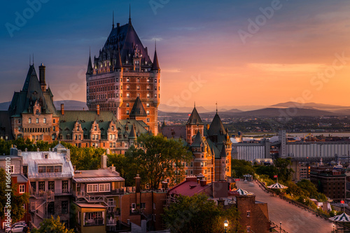 Frontenac Castle in Old Quebec City in the beautiful sunrise light. High dynamic range image. Travel, vacation, history, cityscape, nature, summer, hotels and architecture concept photo