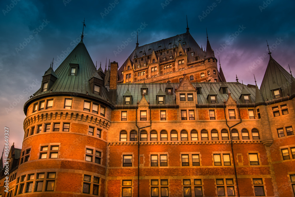 Fototapeta premium Frontenac Castle in Old Quebec City in the beautiful sunrise light. High dynamic range image. Travel, vacation, history, cityscape, nature, summer, hotels and architecture concept