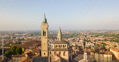 Bergamo  old city  drone aerial view of the Basilica of Santa Maria Maggiore. On the background the Padana plain