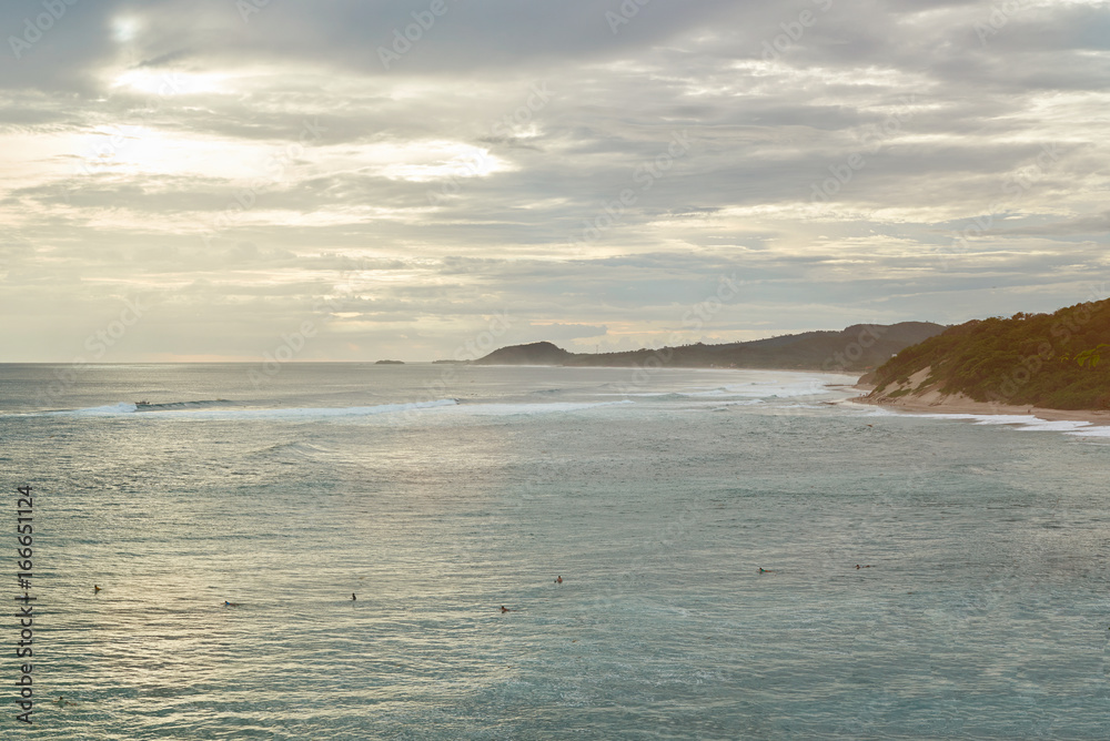 Surfers in ocean waiting for wave Surfers in ocean waiting for wave