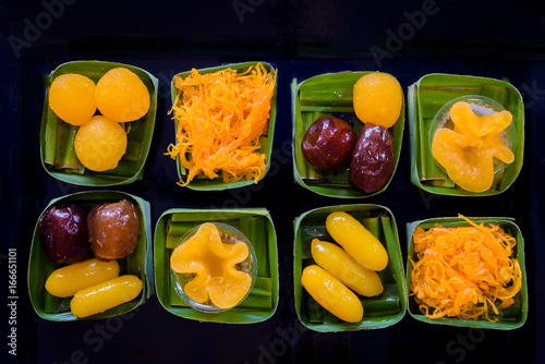 ancient Thai Dessert, thai sweet dessert set,egg yoke fudge balls cooked in syrup, Pinched gold egg yolks, appetizer
