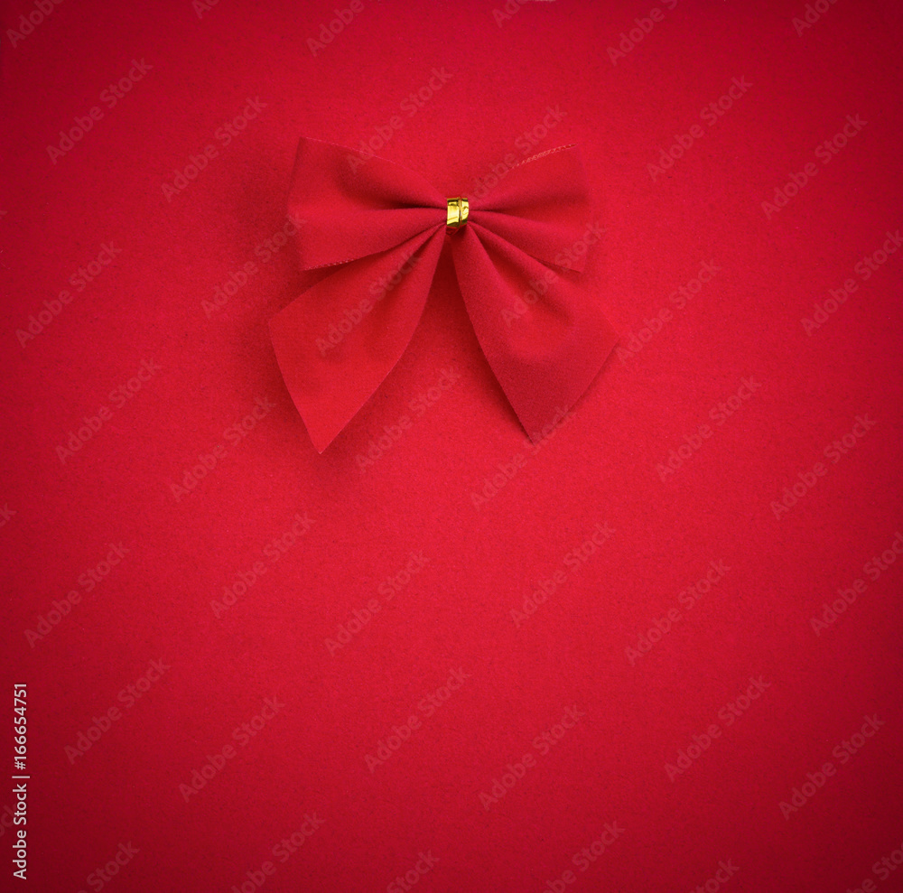 red bow on red background with vignette. mock up for text, congratulations, phrases, lettering