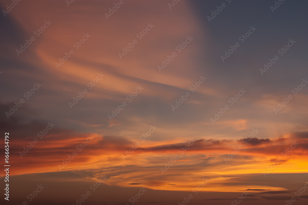Dramatic atmosphere of beautiful romantic sunset sky and clouds.