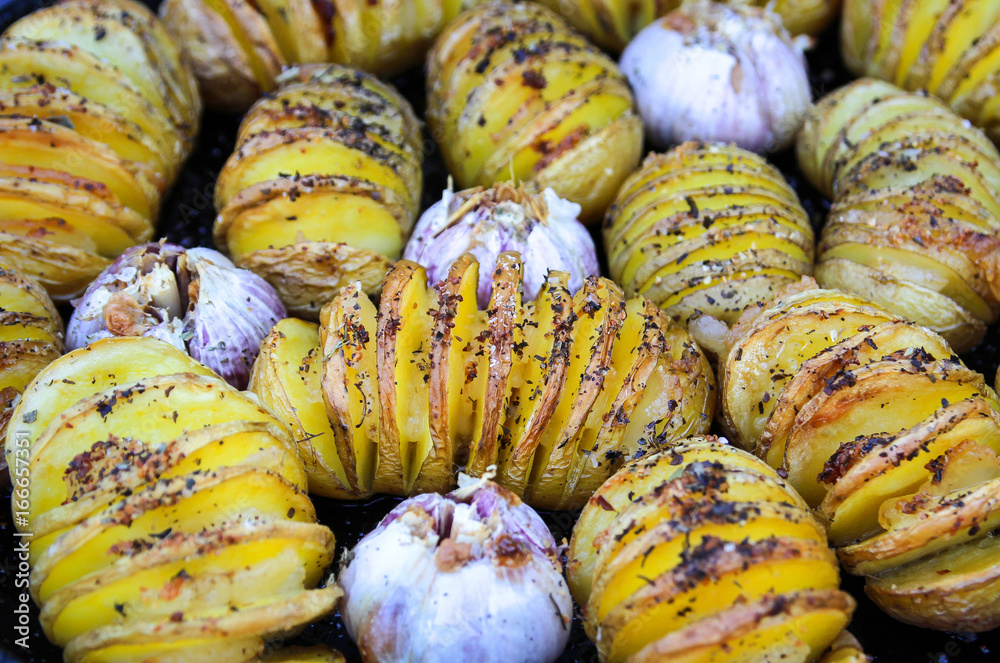 Potatoes baked with bacon and garlic. grilled vegetables. Potatoes baked with bacon and garlic. grilled vegetables.