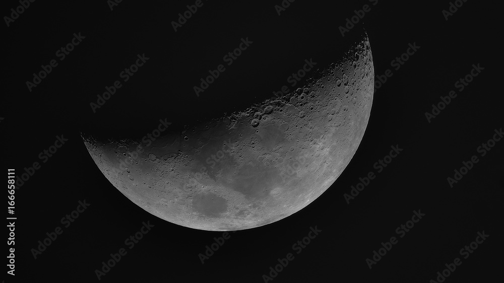 View of the Moon through telescope. View of the Moon through telescope.