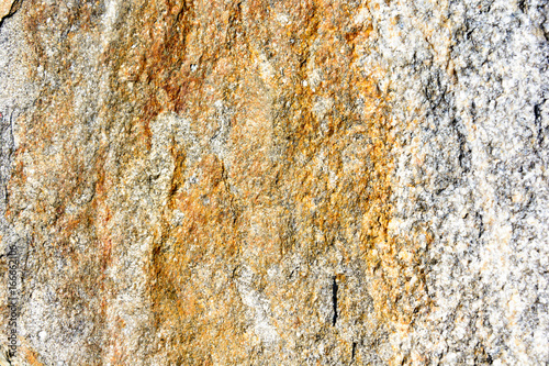 Natural texture of a dark yellow rock