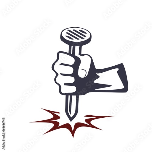 The hand holds a nail
