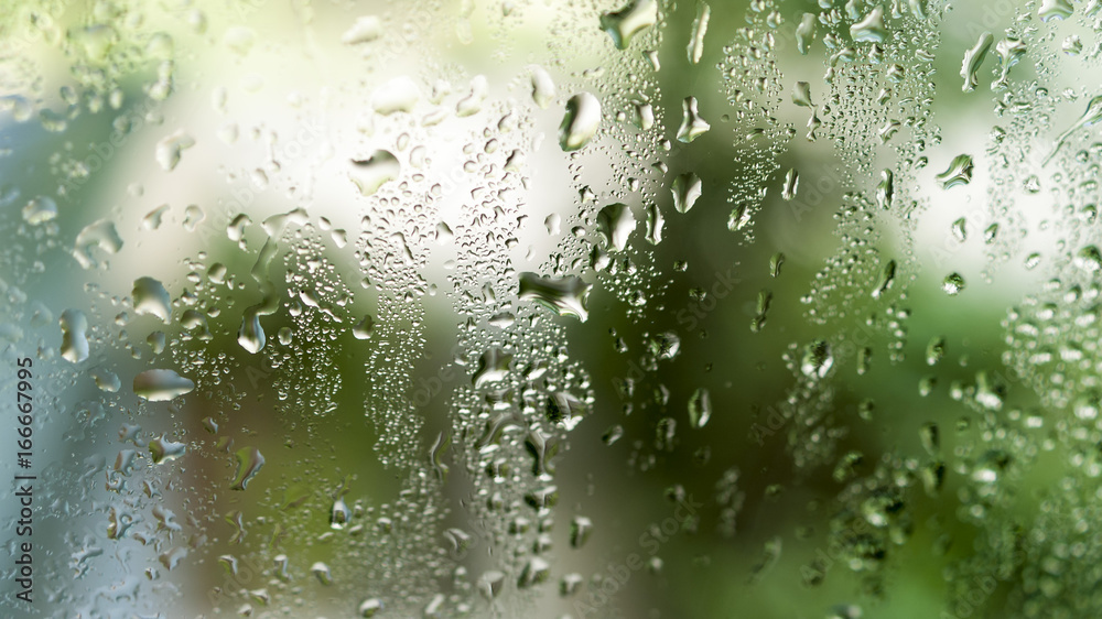 Bokeh drops of water on the glass