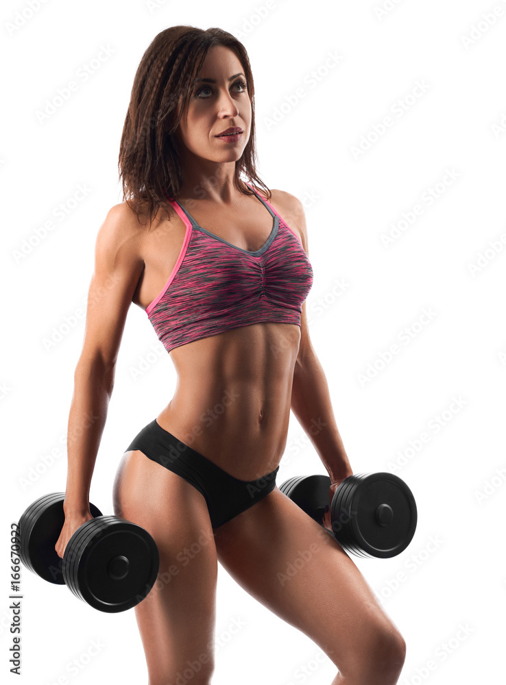 Attractive dark haired athletic woman exercising with dumbbells isolated on white gym sport healthcare fitness beauty lifestyle energetic concept. Attractive dark haired athletic woman exercising with dumbbells isolated on white gym sport healthcare fitness beauty lifestyle energetic concept.