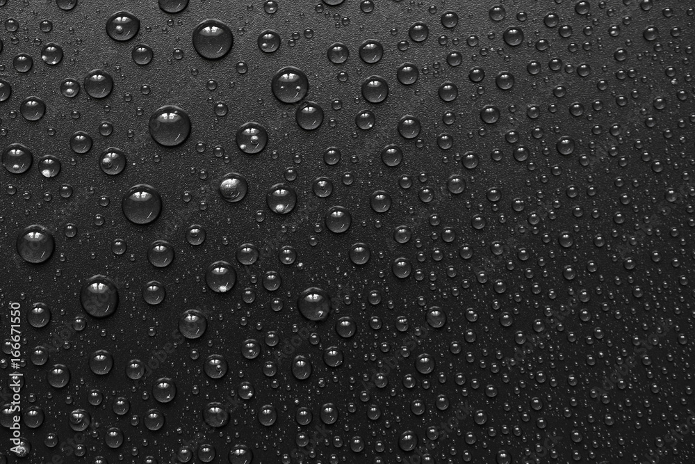 water drops on black background. Macro. water drops on black background. Macro.