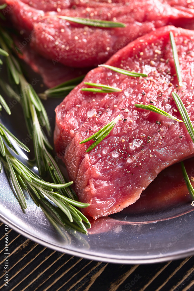 Beef steak with rosemary.