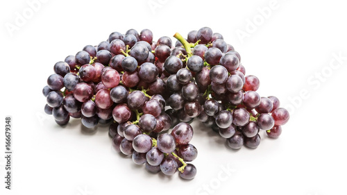 Bunches of ripe grapes on a white background.