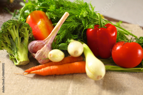 Fresh vegetables on a wooden table. Healthy food. Diet