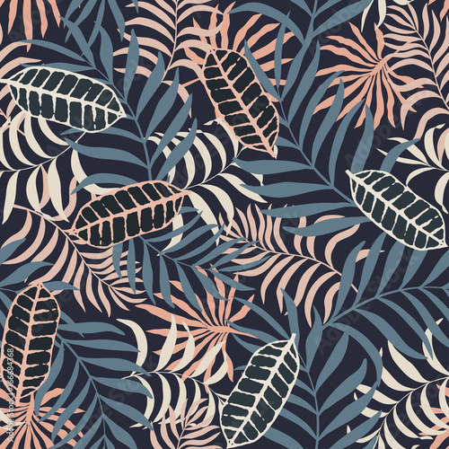 Tropical background with palm leaves. Seamless floral pattern