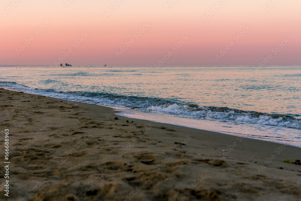 beach and sea at sunrise with beautiful colours