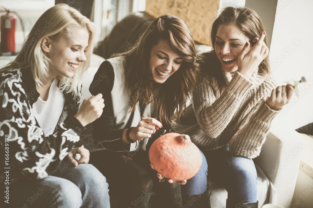 Halloween. Three friends are preparing for Halloween. Halloween. Three friends are preparing for Halloween.