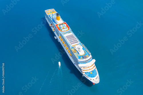 Top view of a colorful cruise ship in the blue sea © watman