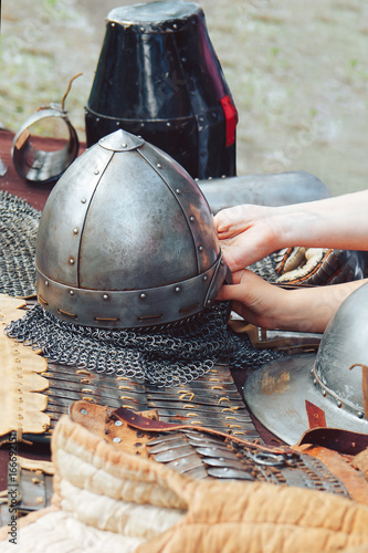 medieval helmet lying on the table