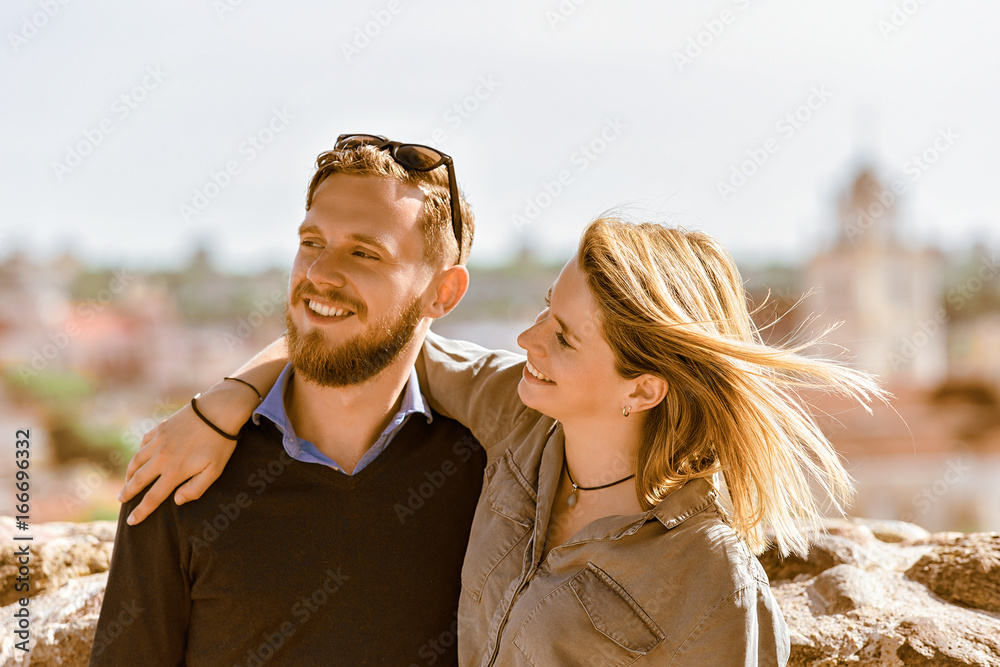 Smiling young brother and sister hugging Smiling young brother and sister hugging
