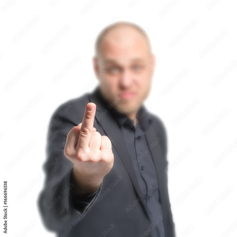 A man in a gray suit showing middle finger. Isolated A man in a gray suit showing middle finger. Isolated
