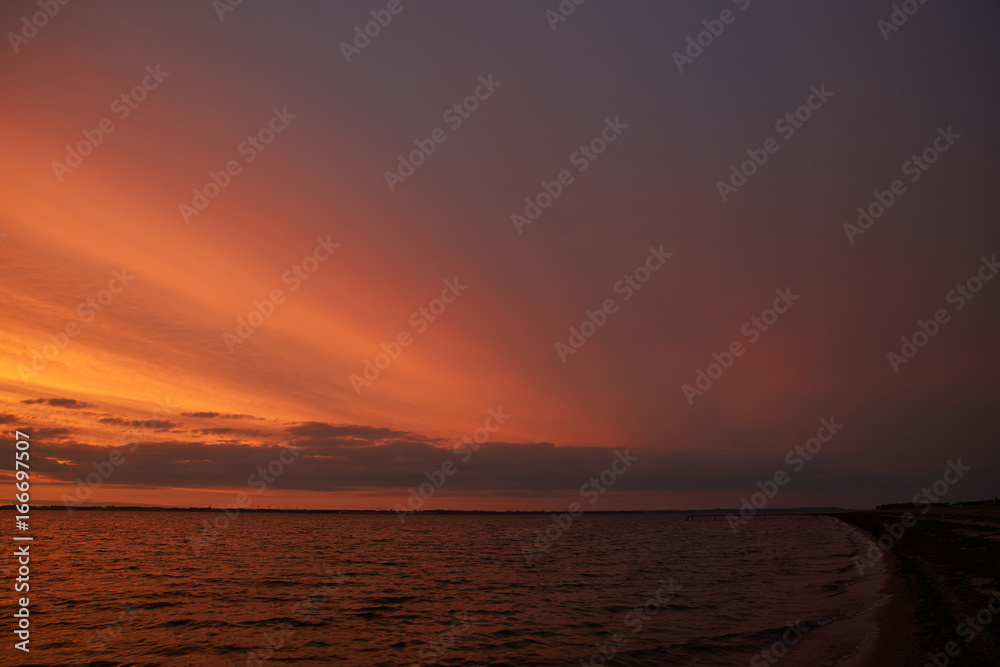 colorful sunset at Vadum beach in Denmark colorful sunset at Vadum beach in Denmark