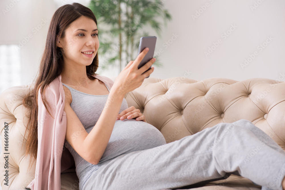 Attractive longhaired woman sending message Attractive longhaired woman sending message