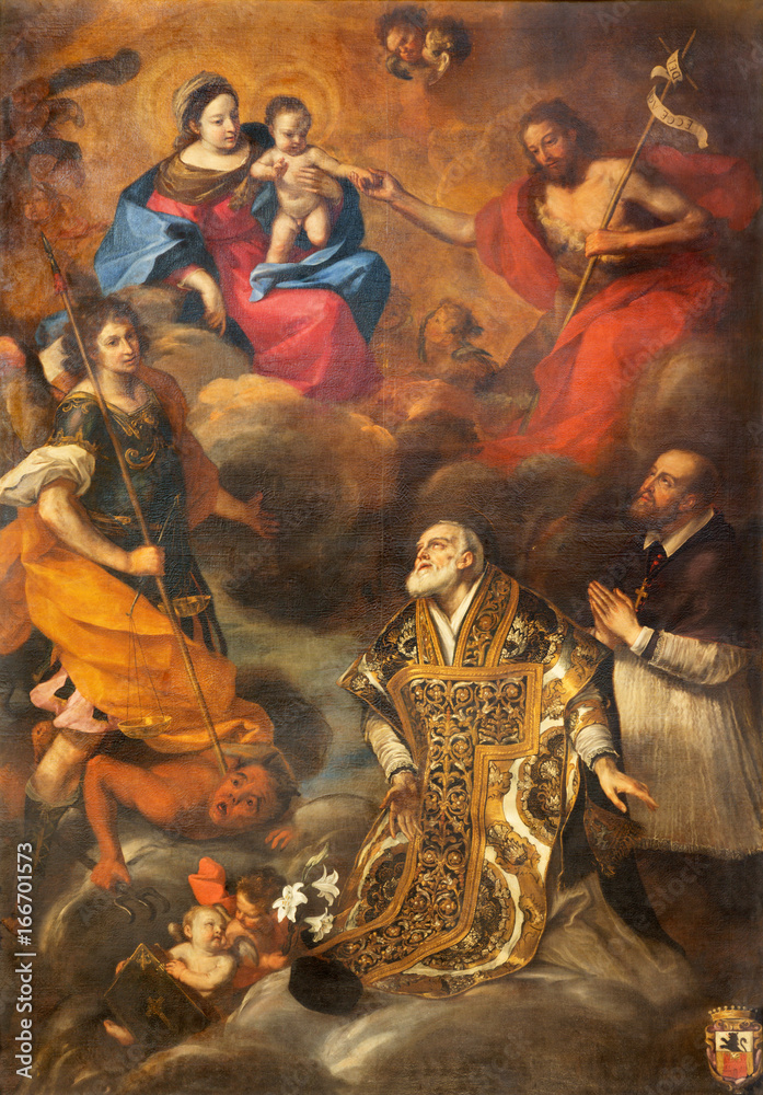 TURIN, ITALY - MARCH 13, 2017:  The painting of Madonna and Jesus, with the st. Philip Neri and archangel Michael in Duomo by Caravoglia da Crescentino (1620 - 1691).
